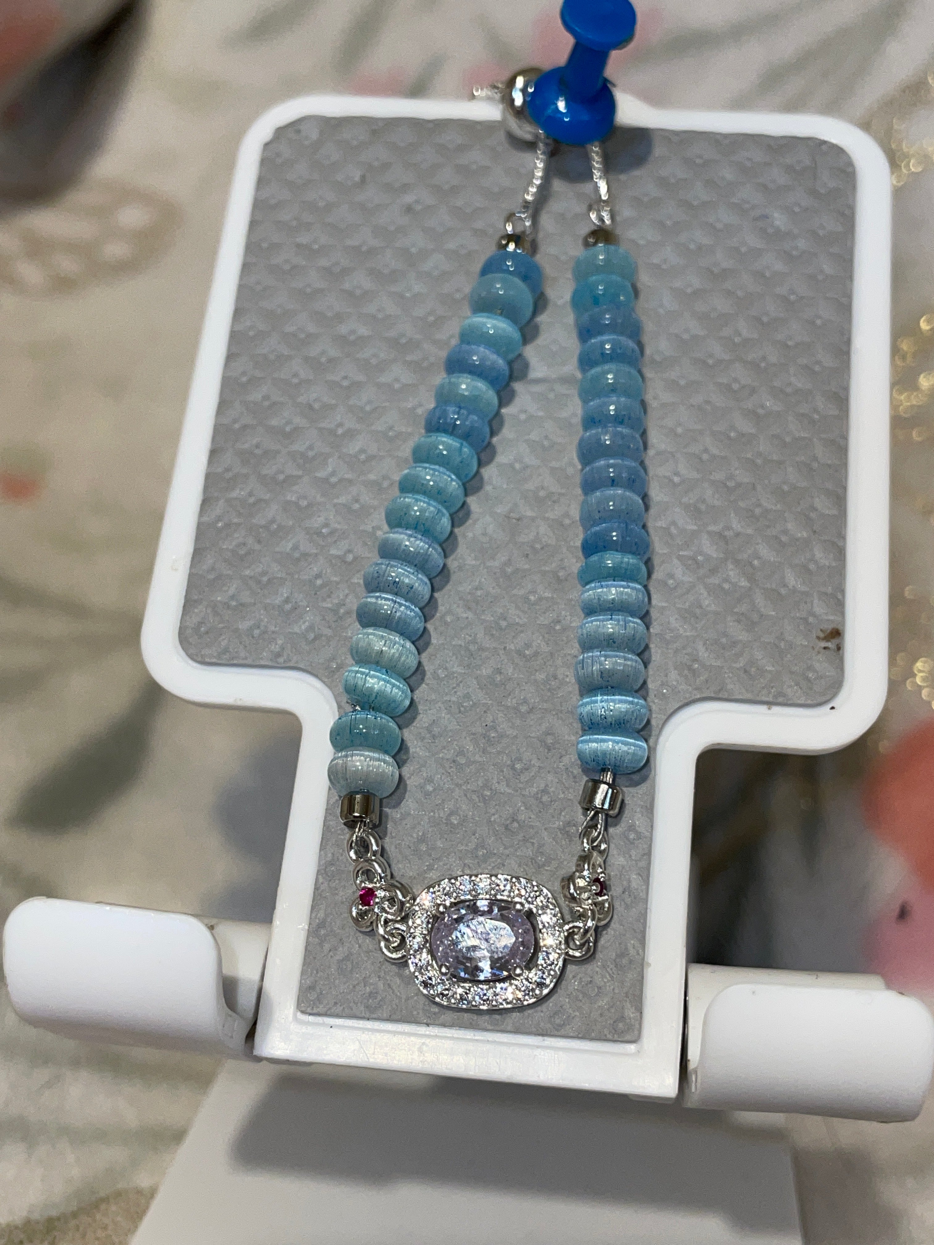 Blue adjustable bracelet with bling in the middle