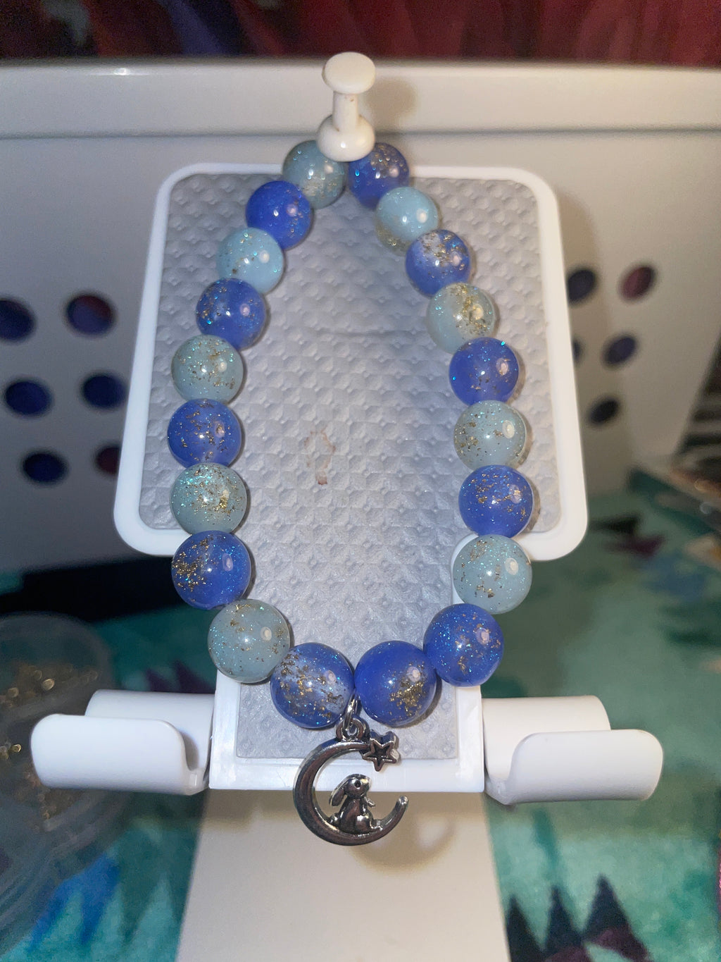 Light/dark blue bracelet with a cute bunny on the moon