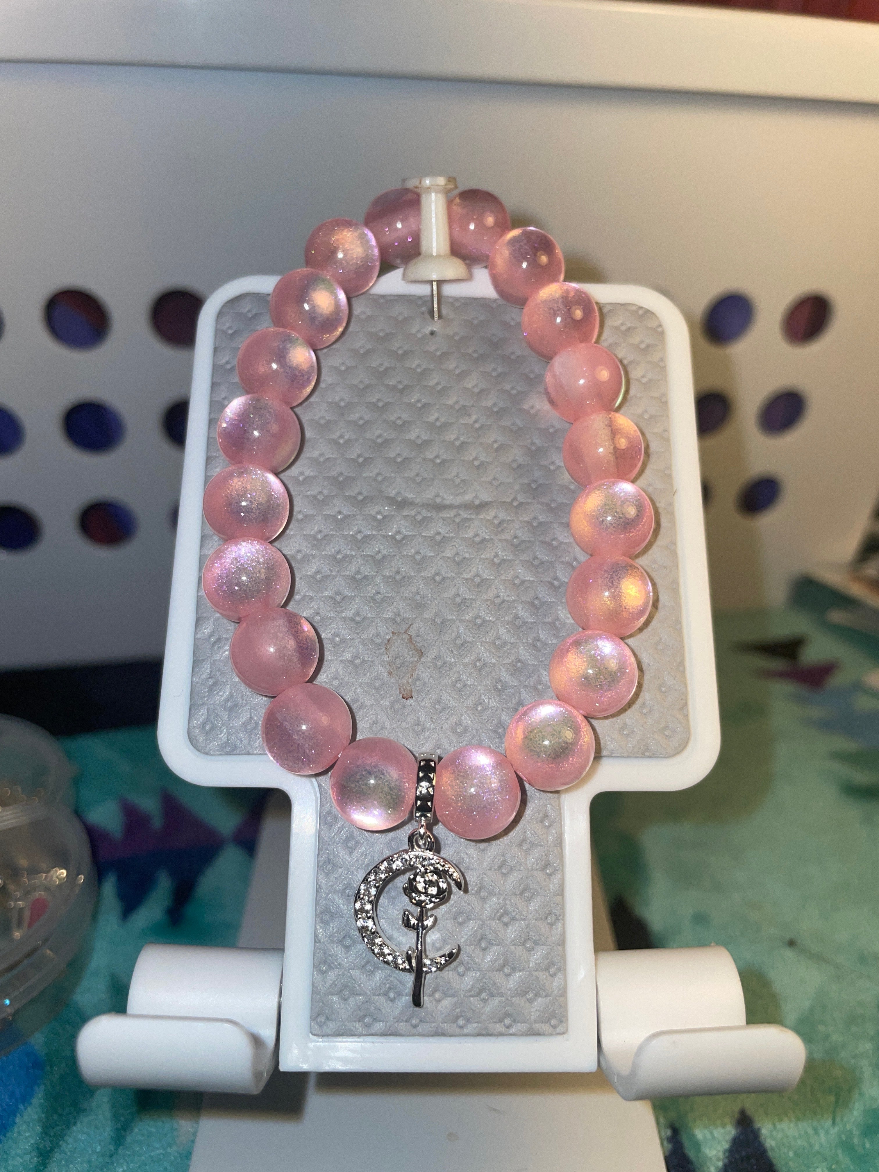 Rose Pink bead bracelet with a moon/rose charm