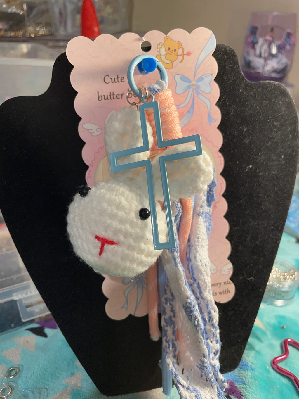 White crochet bunny/blue cross