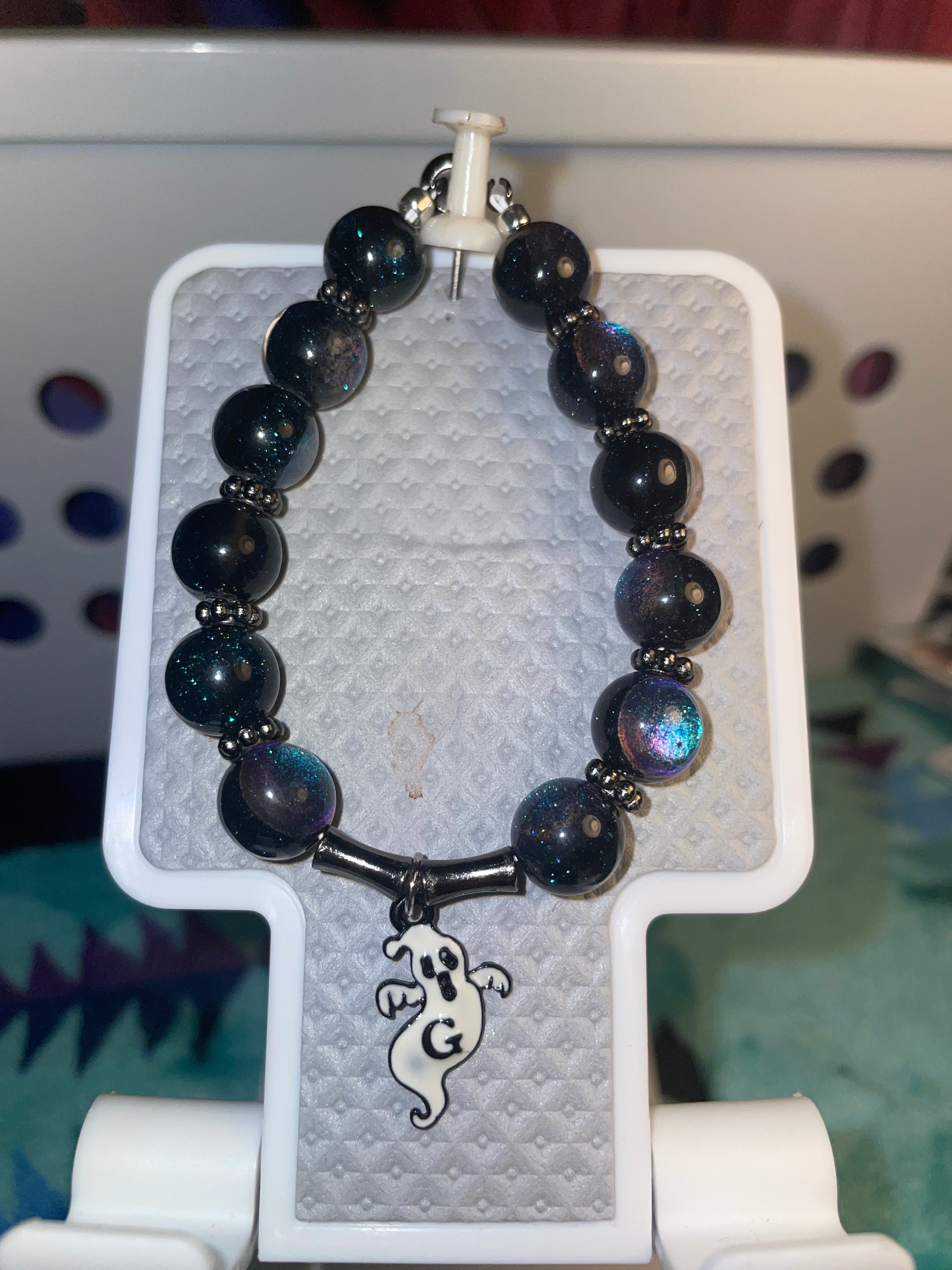 Galaxy black bracelet, with a white ghost ￼