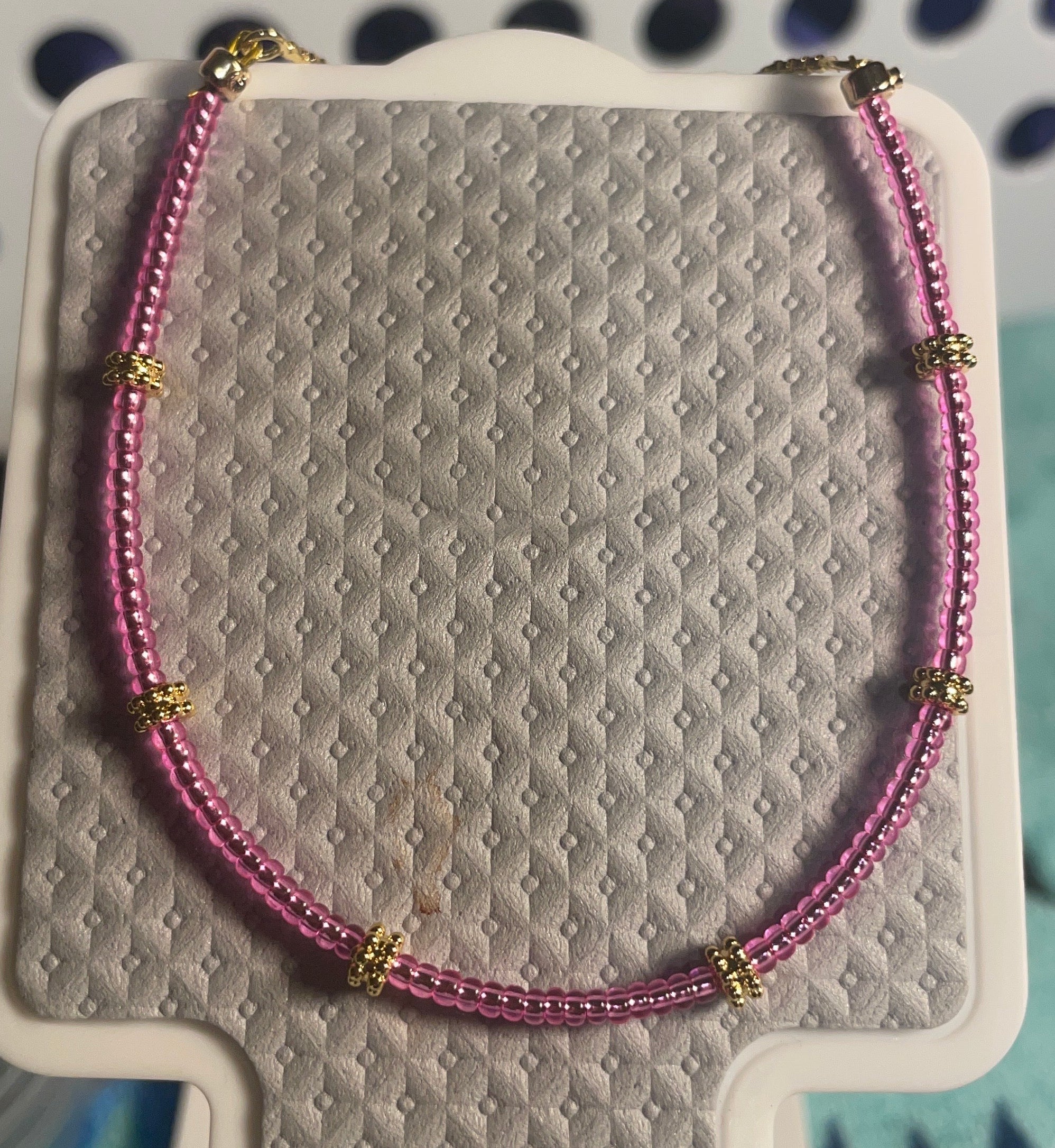 Hand made pink/gold spacers