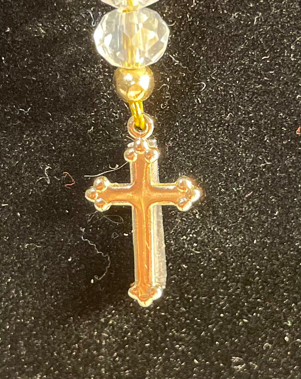 White beads/rosary with gold plated cross.