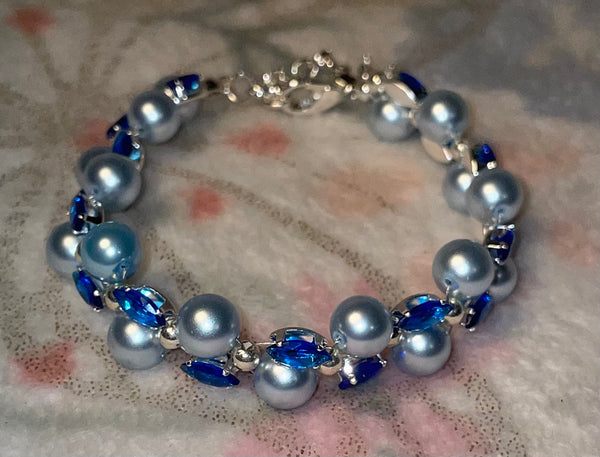 Blue bracelet with fairy