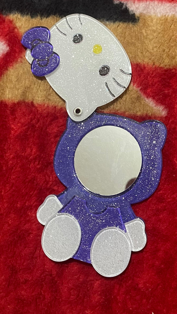 Purple Hello Kitty Phone decoration with mirror.