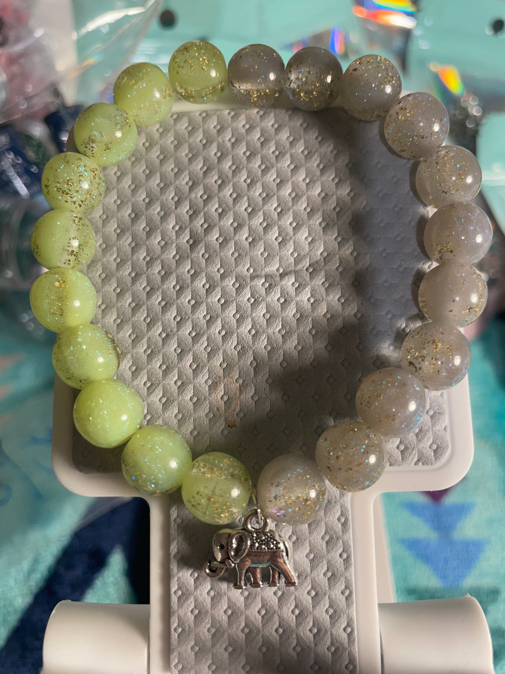 Lime green/gray bracelet with an elephant for a charm