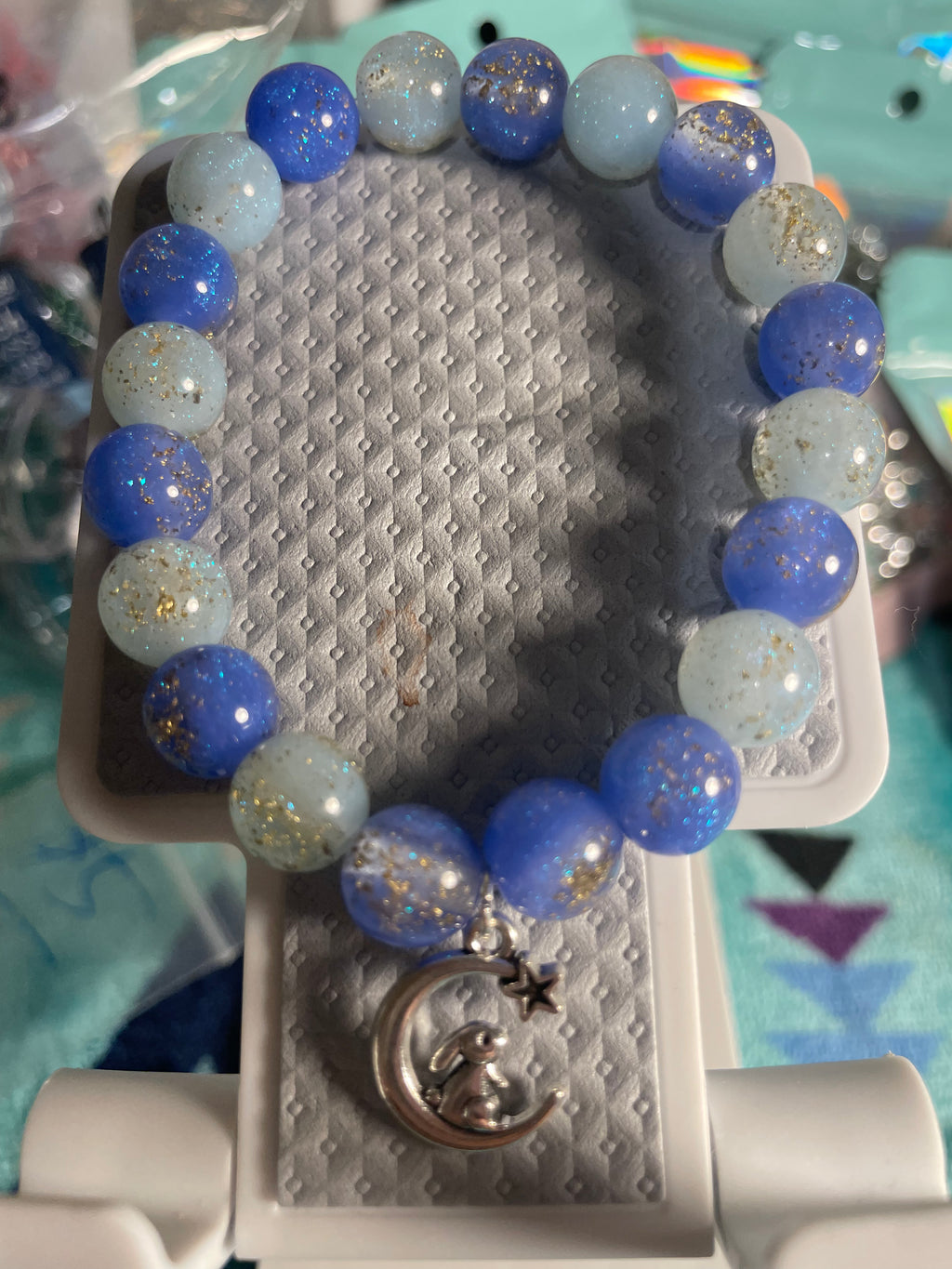 Light/dark blue bracelet with a cute bunny on the moon